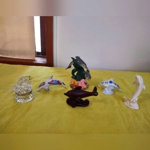 Lenox dolphins except for one in middle